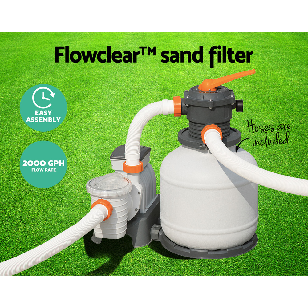 vacuuming above ground pool with sand filter